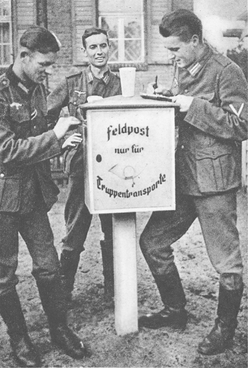 WW2 German wehrmacht soldier writting letter feldpost box